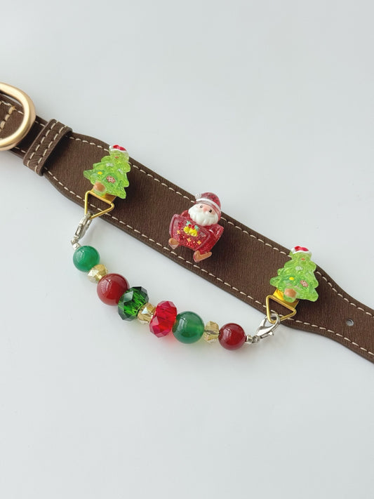 Pawlsle Trails Handmade Christmas-themed microfiber leather crystal pet collar, featuring Santa Claus and Christmas tree charms.