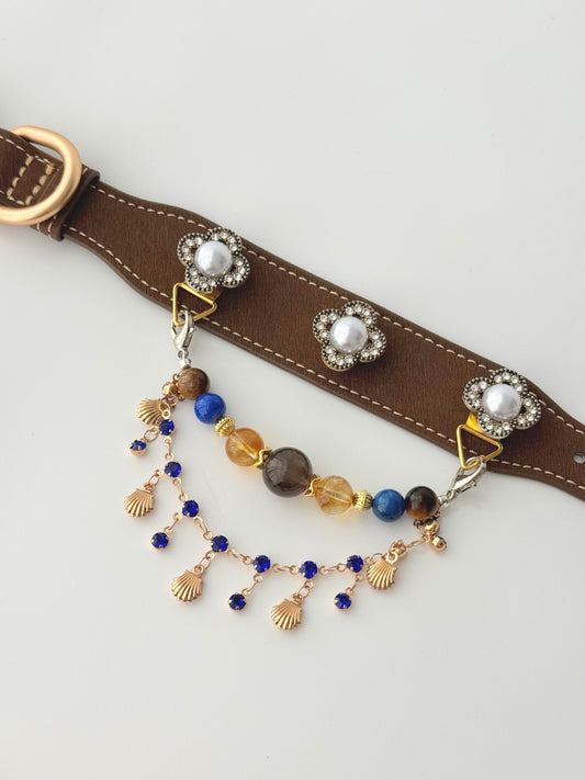 Pawlsle Trails Vintage-inspired pearl and seashell pet collar—a luxurious, ultra-lightweight leather collar featuring a striking double-strand chain of exquisite gems; an elegantly handcrafted accessory for your pet.