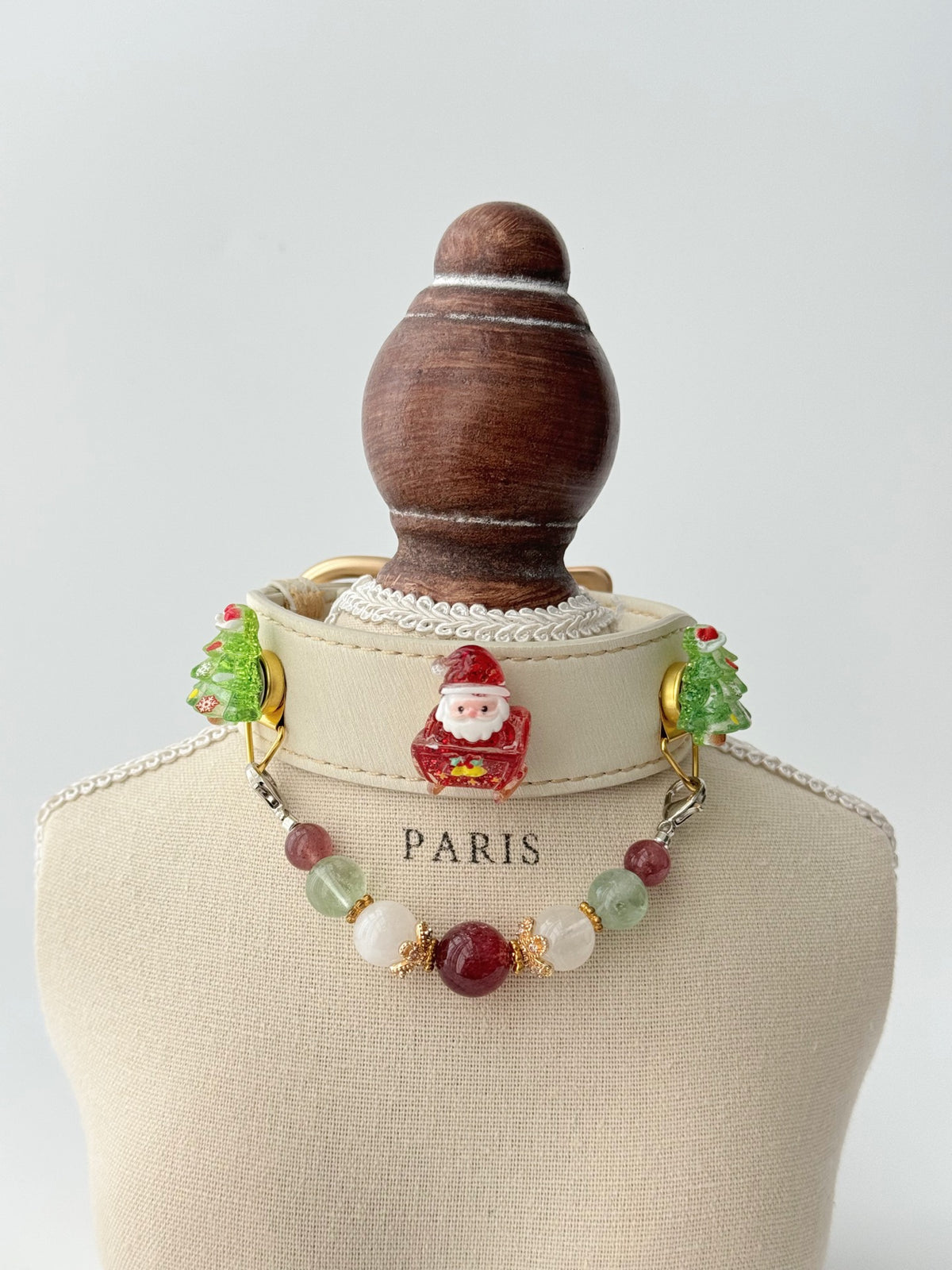 Pawlsle Trails Handmade Christmas-themed microfiber leather crystal pet collar, featuring Santa Claus and Christmas tree charms.