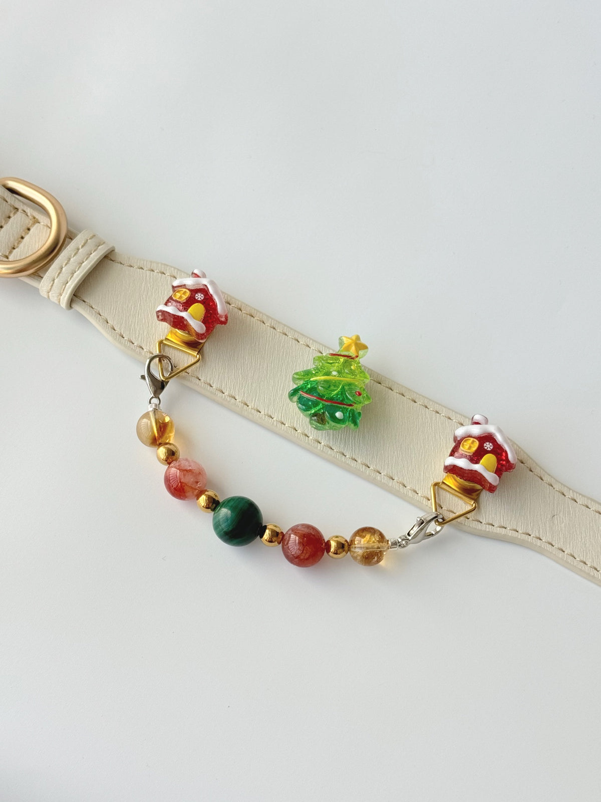 Pawlsle Trails Festive Sparkling Pet Collar Set, featuring a Christmas tree design and crafted from high-quality leather and natural crystal beads.