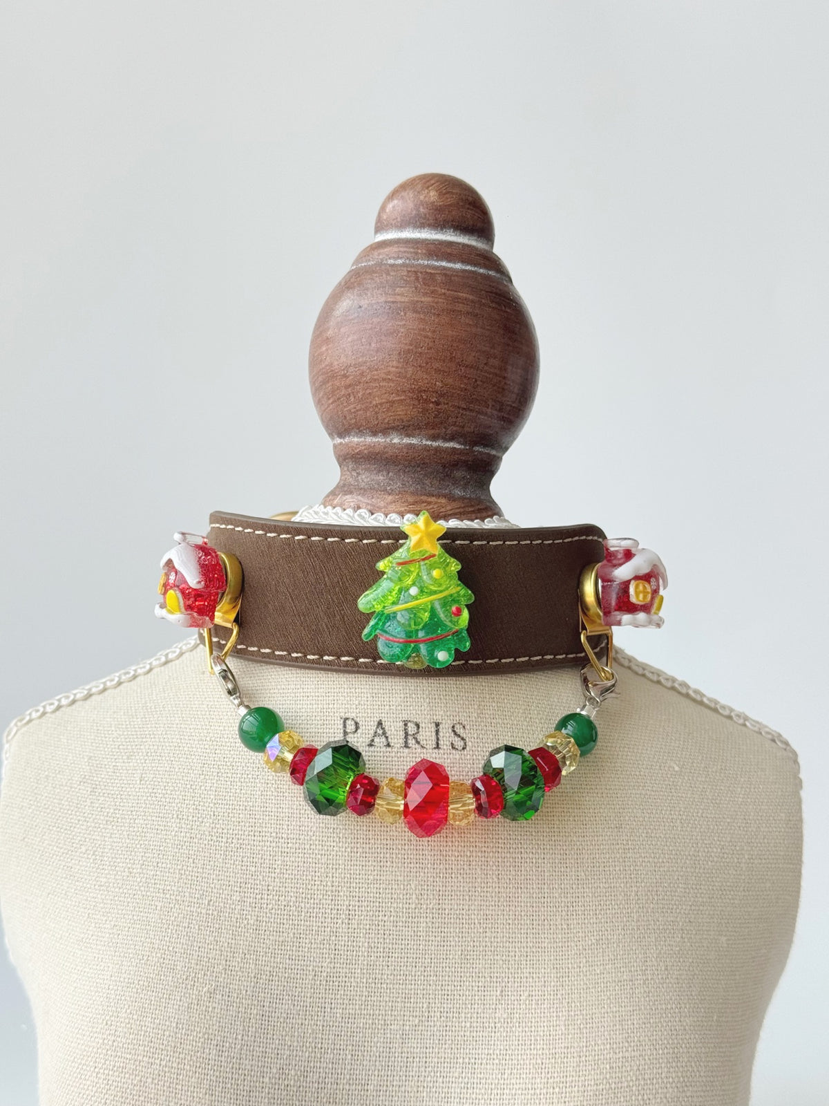 Pawlsle Trails Festive Sparkling Pet Collar Set, featuring a Christmas tree design and crafted from high-quality leather and natural crystal beads.