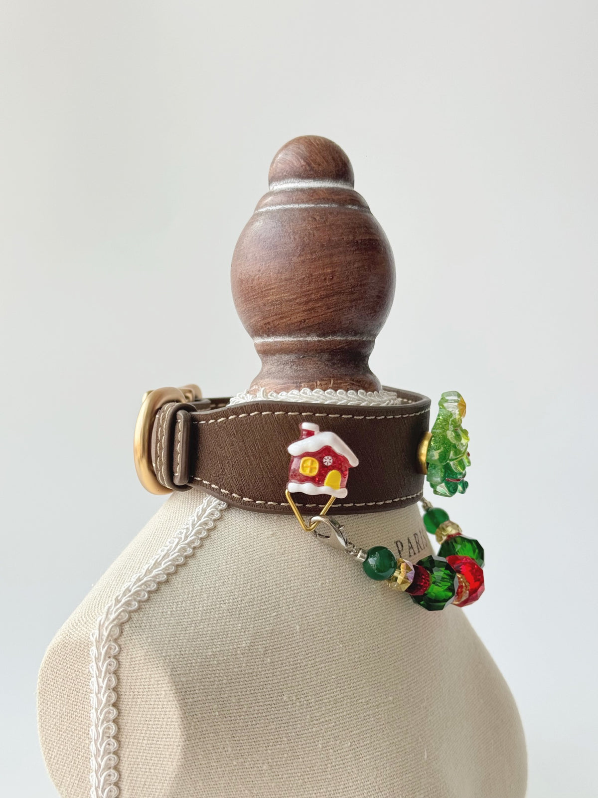 Pawlsle Trails Festive Sparkling Pet Collar Set, featuring a Christmas tree design and crafted from high-quality leather and natural crystal beads.
