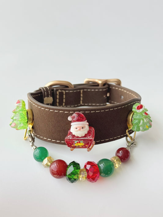 Pawlsle Trails Handmade Christmas-themed microfiber leather crystal pet collar, featuring Santa Claus and Christmas tree charms.