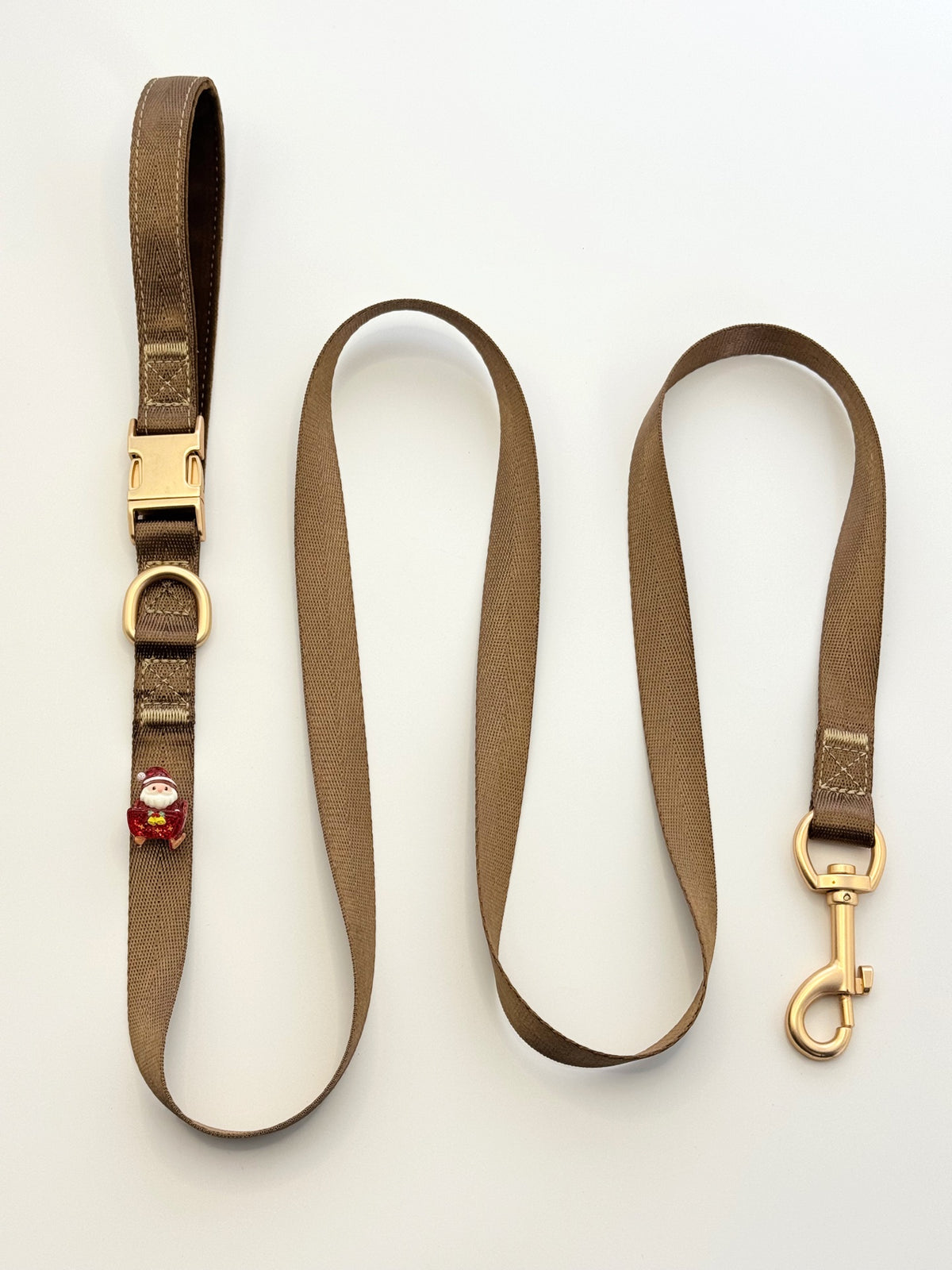 Pawlsle Trails Handmade Christmas-themed microfiber leather crystal pet collar, featuring Santa Claus and Christmas tree charms. Leash