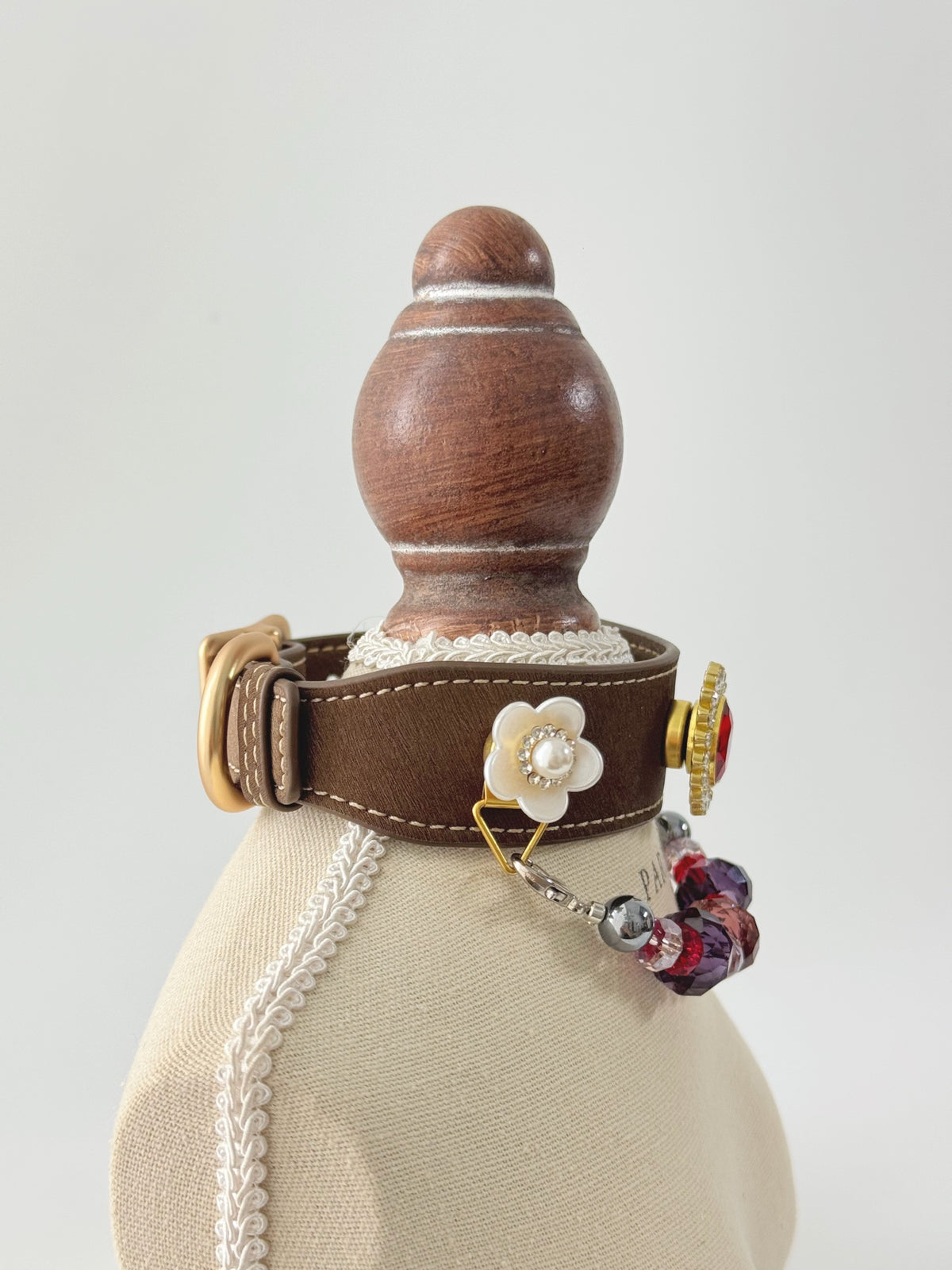 Pawlsle Trails A premium, vintage-inspired gemstone pet collar—a luxurious, handcrafted leather piece featuring a wearable crystal-bead chain; an elegant, artisanal accessory for your pet.