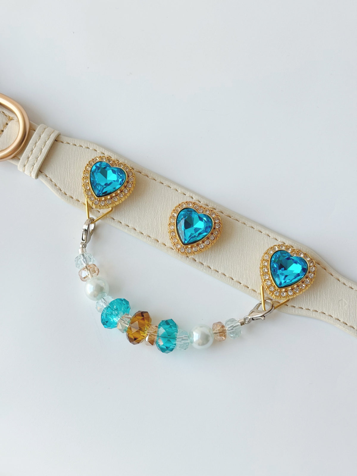 Pawlsle Trails Luxurious "Heart of the Ocean" crystal pet collar—an elegant white microfiber collar adorned with beaded gemstones.