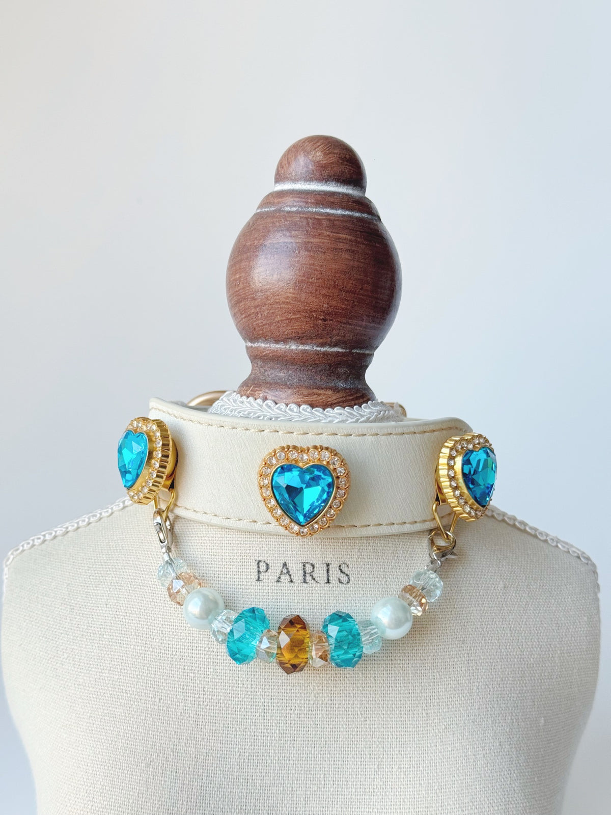 Pawlsle Trails Luxurious "Heart of the Ocean" crystal pet collar—an elegant white microfiber collar adorned with beaded gemstones.