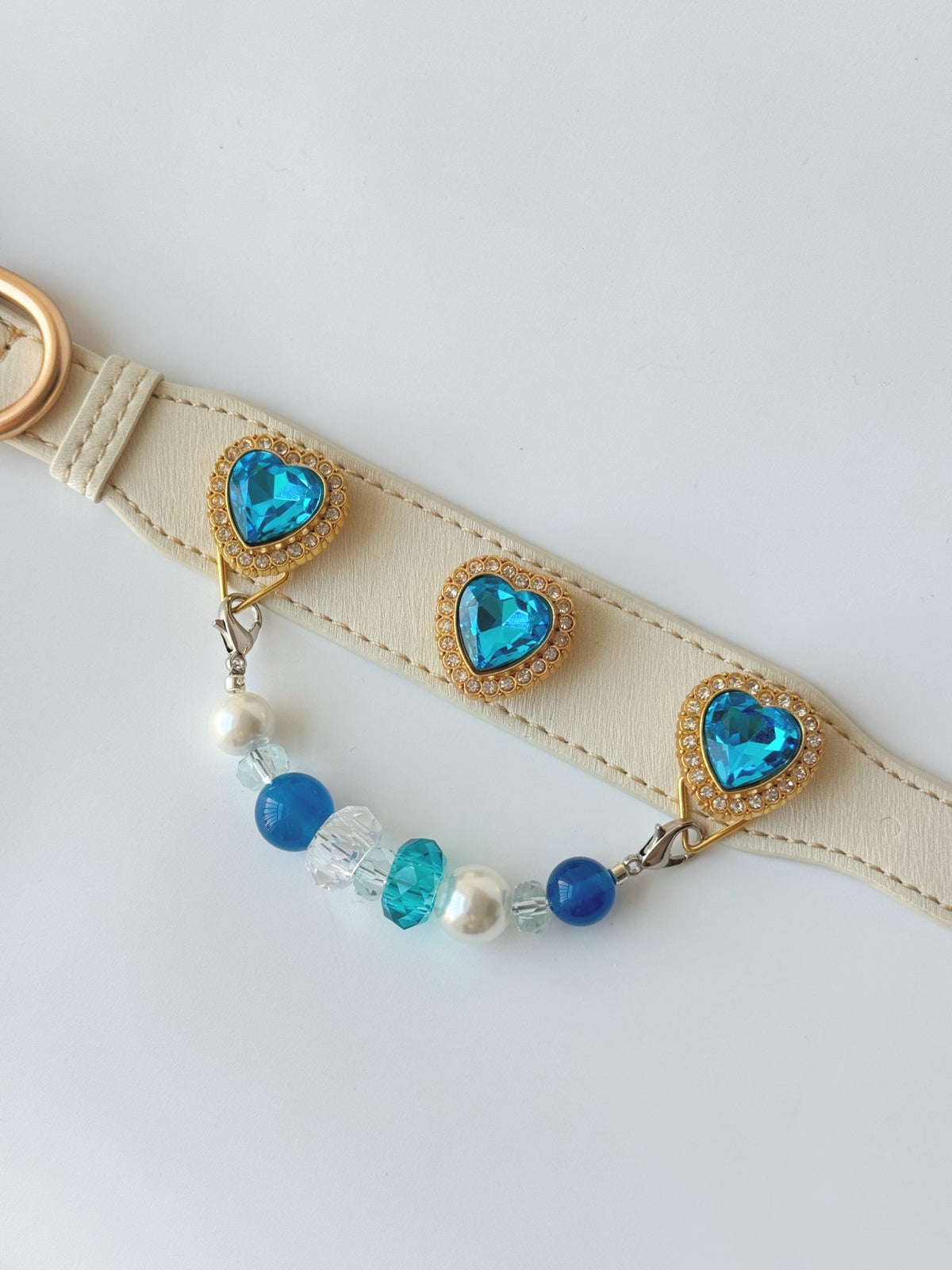 Pawlsle Trails Luxurious "Heart of the Ocean" crystal pet collar—an elegant white microfiber collar adorned with beaded gemstones.