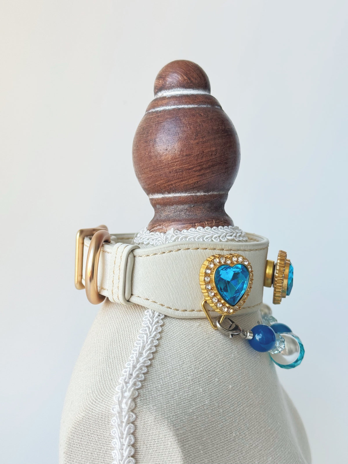 Pawlsle Trails Luxurious "Heart of the Ocean" crystal pet collar—an elegant white microfiber collar adorned with beaded gemstones.