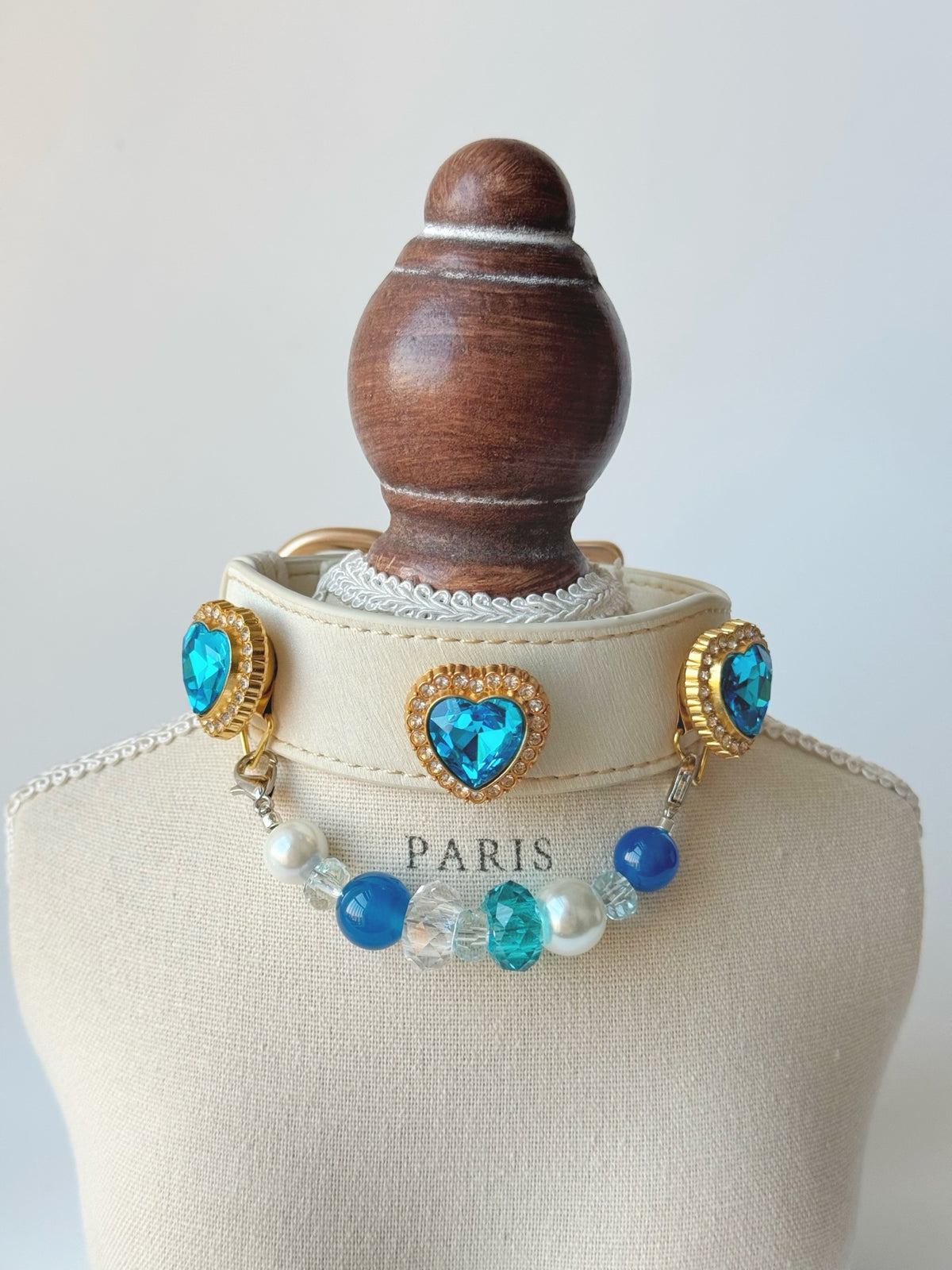 Pawlsle Trails Luxurious "Heart of the Ocean" crystal pet collar—an elegant white microfiber collar adorned with beaded gemstones.