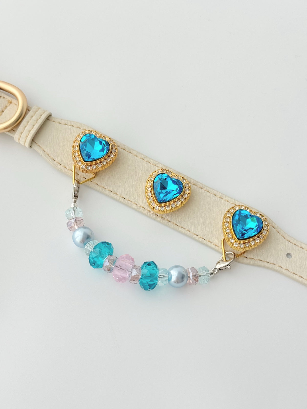 Pawlsle Trails Luxurious "Heart of the Ocean" crystal pet collar—an elegant white microfiber collar adorned with beaded gemstones.