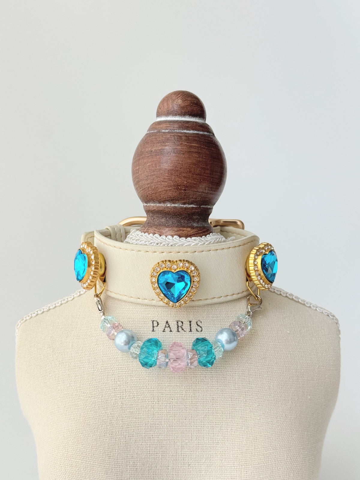 Pawlsle Trails Luxurious "Heart of the Ocean" crystal pet collar—an elegant white microfiber collar adorned with beaded gemstones.
