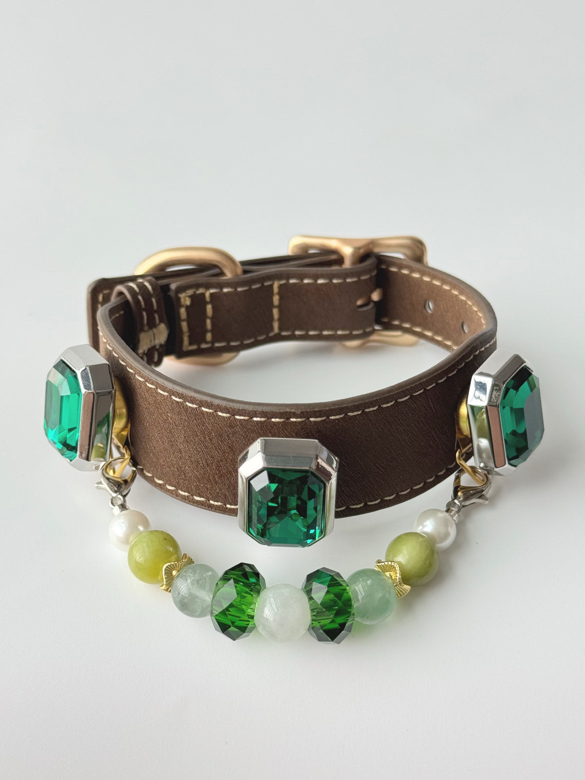 Pawlsle Trails Emerald-toned, gemstone-style microfiber leather pet collar featuring a detachable beaded chain; designed to be non-stick to fur, comfortable, and adjustable.