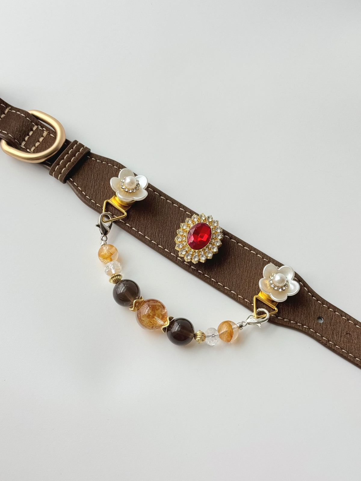 Pawlsle Trails A premium, vintage-inspired gemstone pet collar—a luxurious, handcrafted leather piece featuring a wearable crystal-bead chain; an elegant, artisanal accessory for your pet.