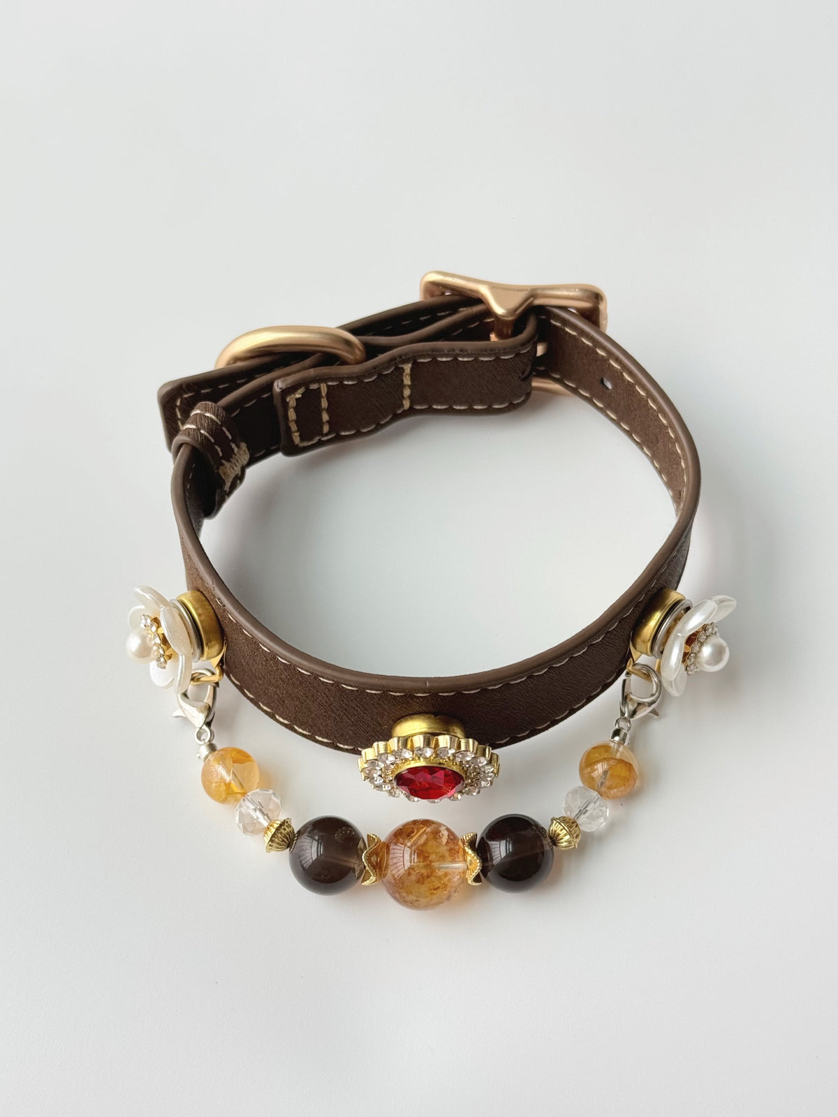 Pawlsle Trails A premium, vintage-inspired gemstone pet collar—a luxurious, handcrafted leather piece featuring a wearable crystal-bead chain; an elegant, artisanal accessory for your pet.