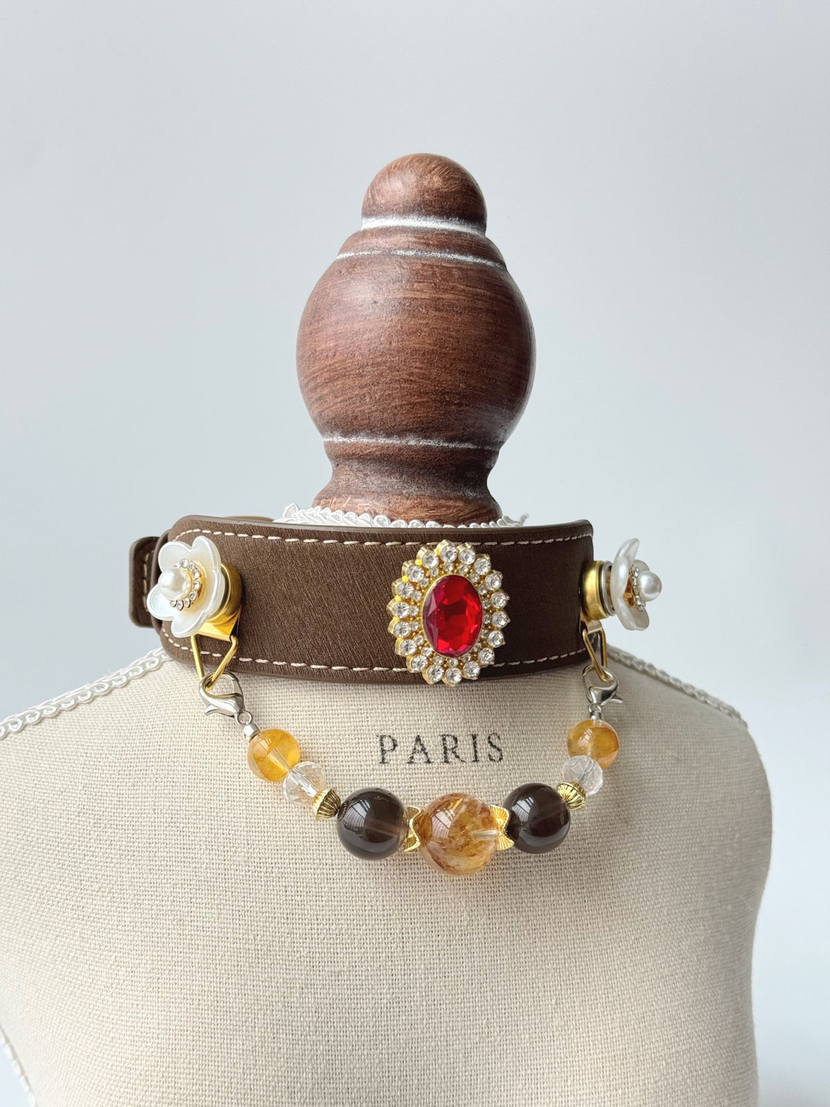 Pawlsle Trails A premium, vintage-inspired gemstone pet collar—a luxurious, handcrafted leather piece featuring a wearable crystal-bead chain; an elegant, artisanal accessory for your pet.