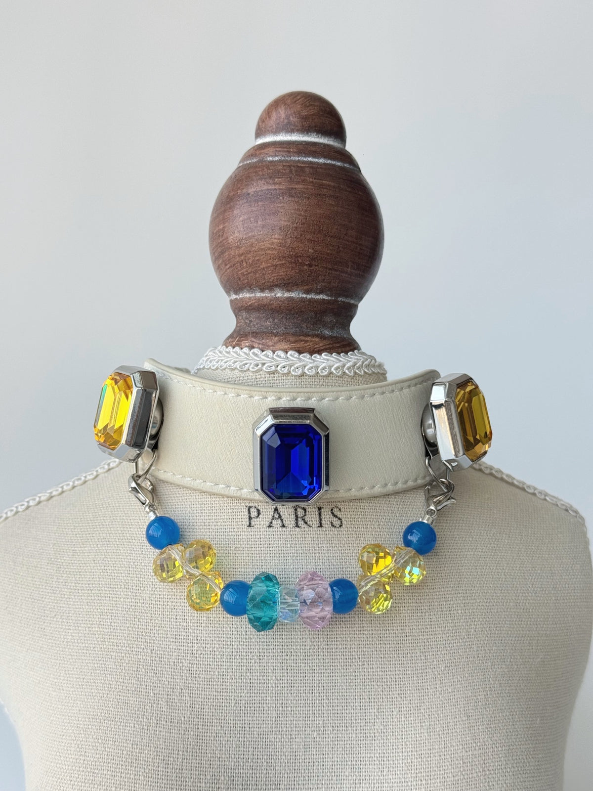 Pawlsle Trails Vintage-style square-embellished pet collar, crafted from luxurious microfiber leather and featuring a string of tactile crystal beads—a stylish, handmade accessory for your pet.