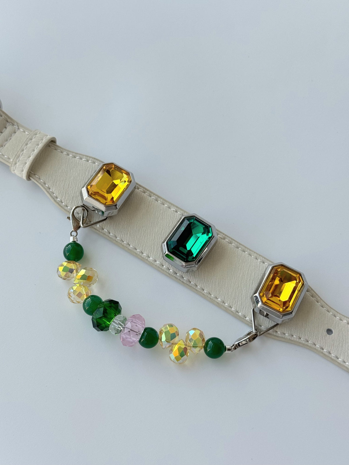 Pawlsle Trails Emerald-toned, gemstone-style microfiber leather pet collar featuring a detachable beaded chain; designed to be non-stick to fur, comfortable, and adjustable.