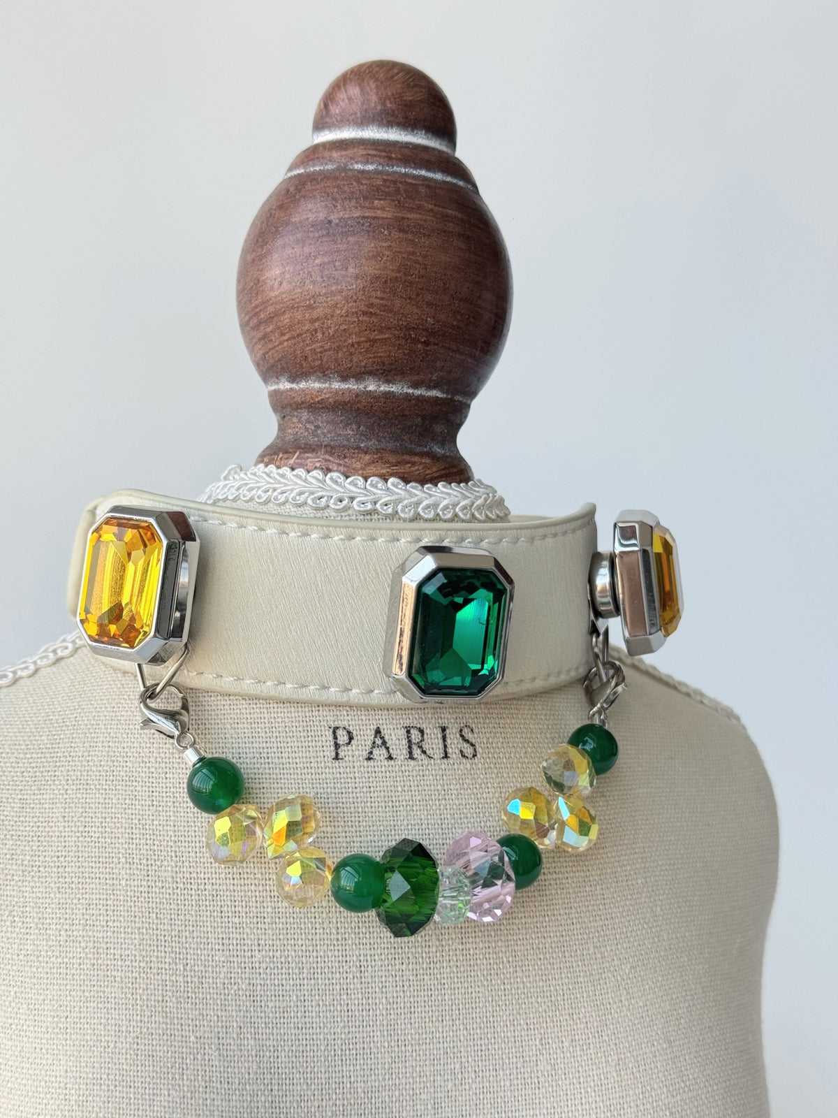 Pawlsle Trails Emerald-toned, gemstone-style microfiber leather pet collar featuring a detachable beaded chain; designed to be non-stick to fur, comfortable, and adjustable.