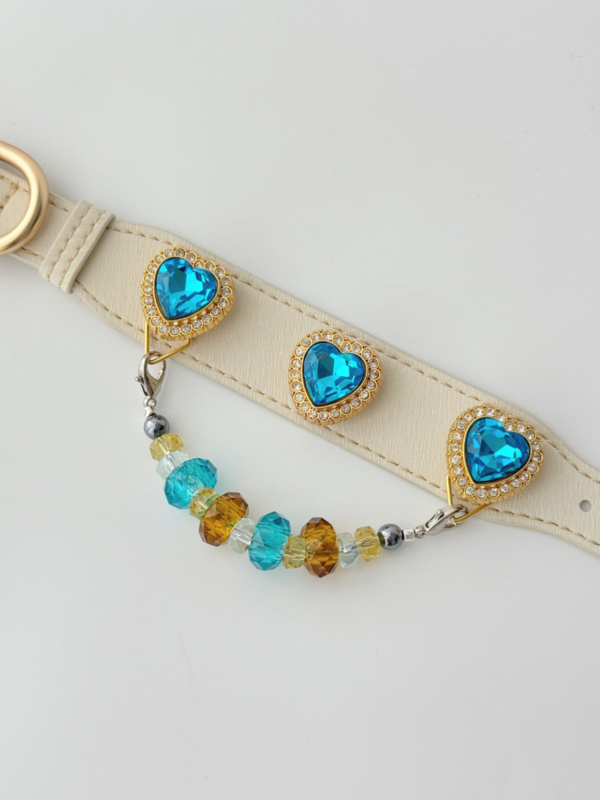Pawlsle Trails Luxurious "Heart of the Ocean" crystal pet collar—an elegant white microfiber collar adorned with beaded gemstones.