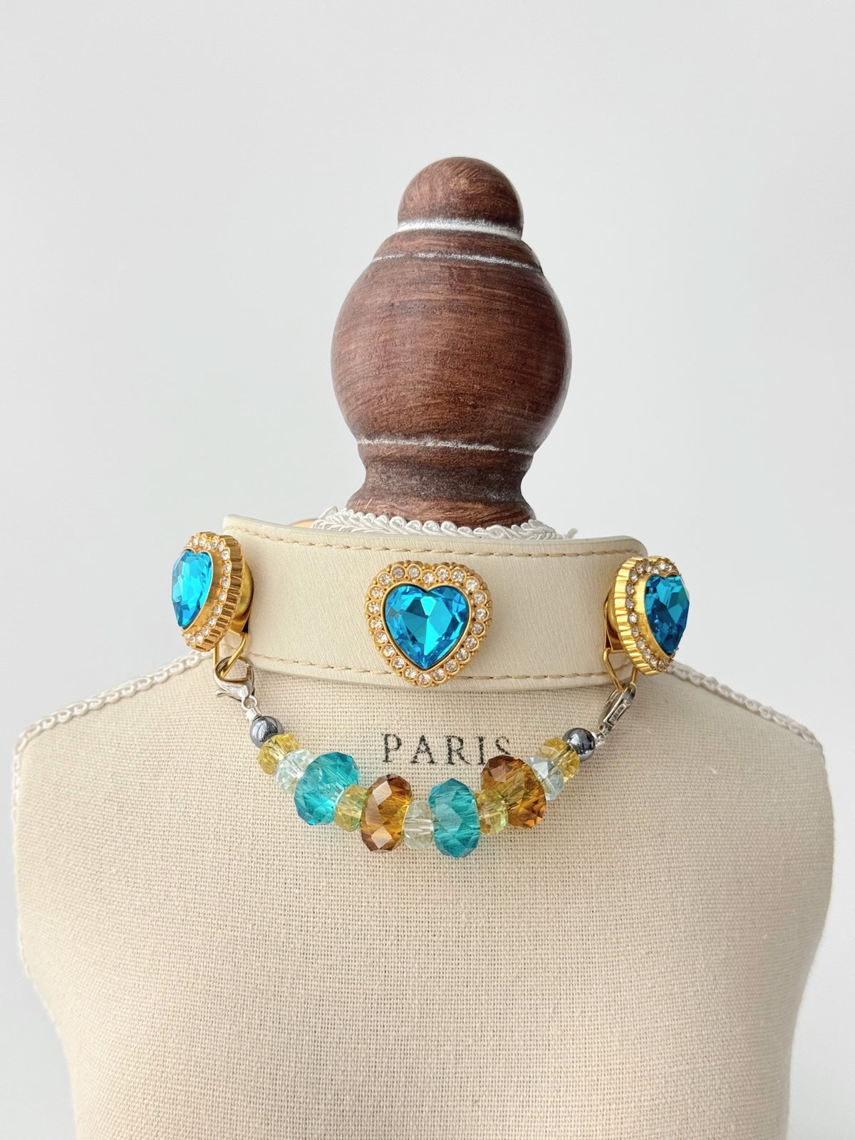 Pawlsle Trails Luxurious "Heart of the Ocean" crystal pet collar—an elegant white microfiber collar adorned with beaded gemstones.