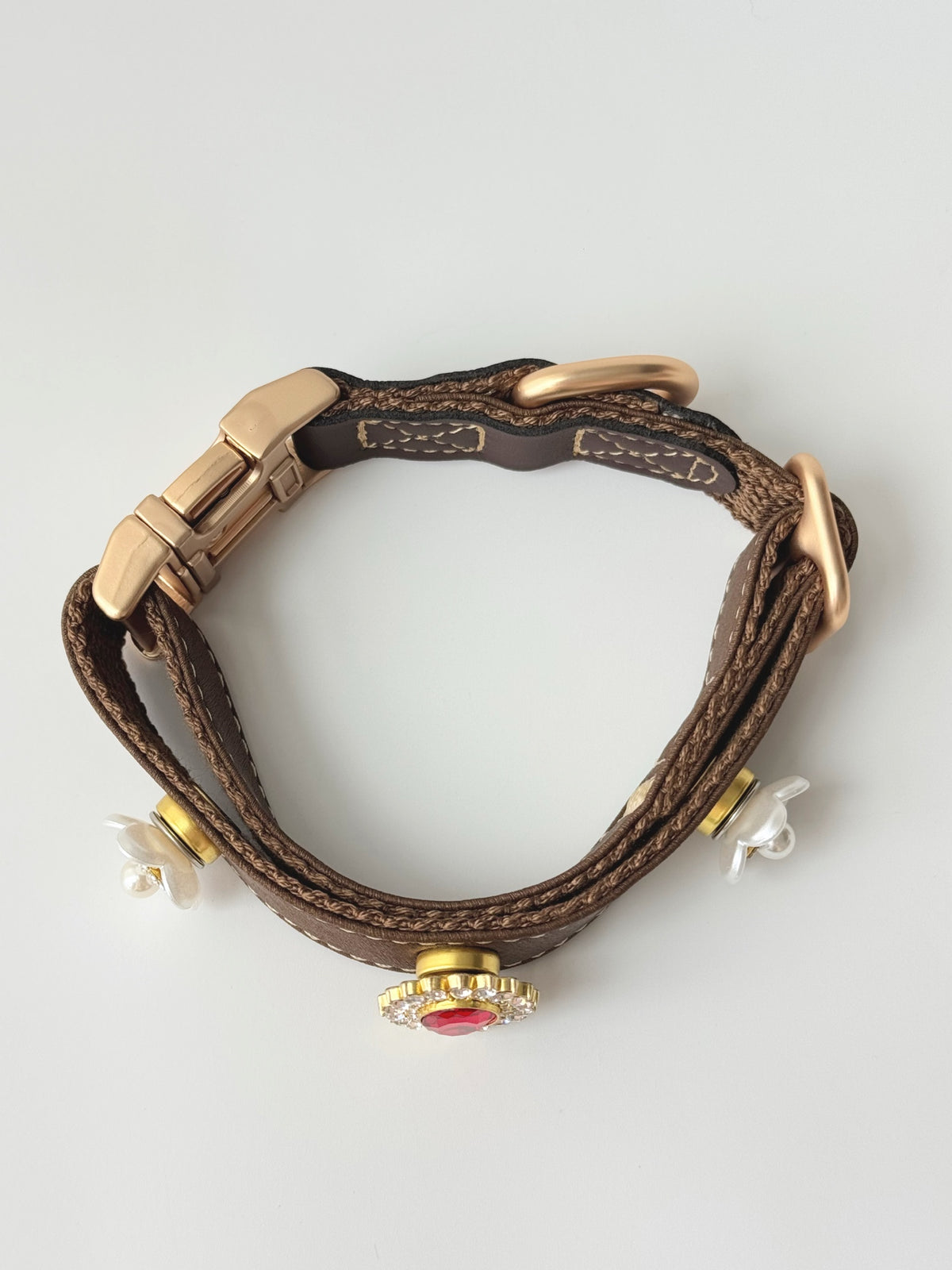 Pawlsle Trails Vintage-Style Ruby Crystal Pet Collar · Crafted from luxurious, soft microfiber leather and accented with pearl flowers—an elegant, designer-style accessory for pets.