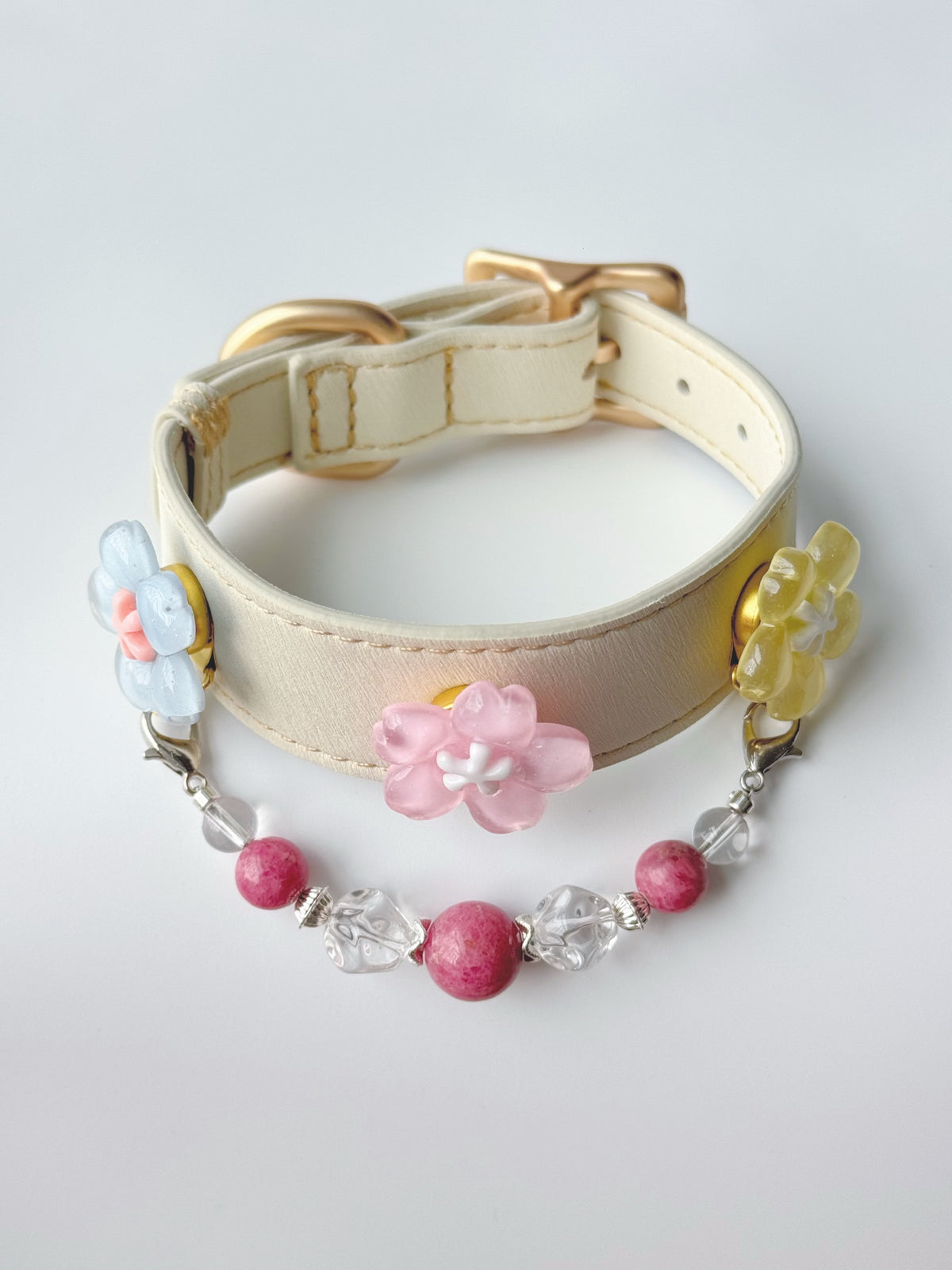 Pawlsle Trails Cherry blossom-themed pet collar set, featuring a beige microfiber leather collar adorned with a detachable, handcrafted chain of beaded gems—a floral-style accessory designed for cats as well as small, medium, and large dogs. Style 1