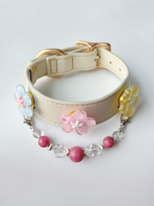 Pawlsle Trails Cherry blossom-themed pet collar set, featuring a beige microfiber leather collar adorned with a detachable, handcrafted chain of beaded gems—a floral-style accessory designed for cats as well as small, medium, and large dogs. Style 1