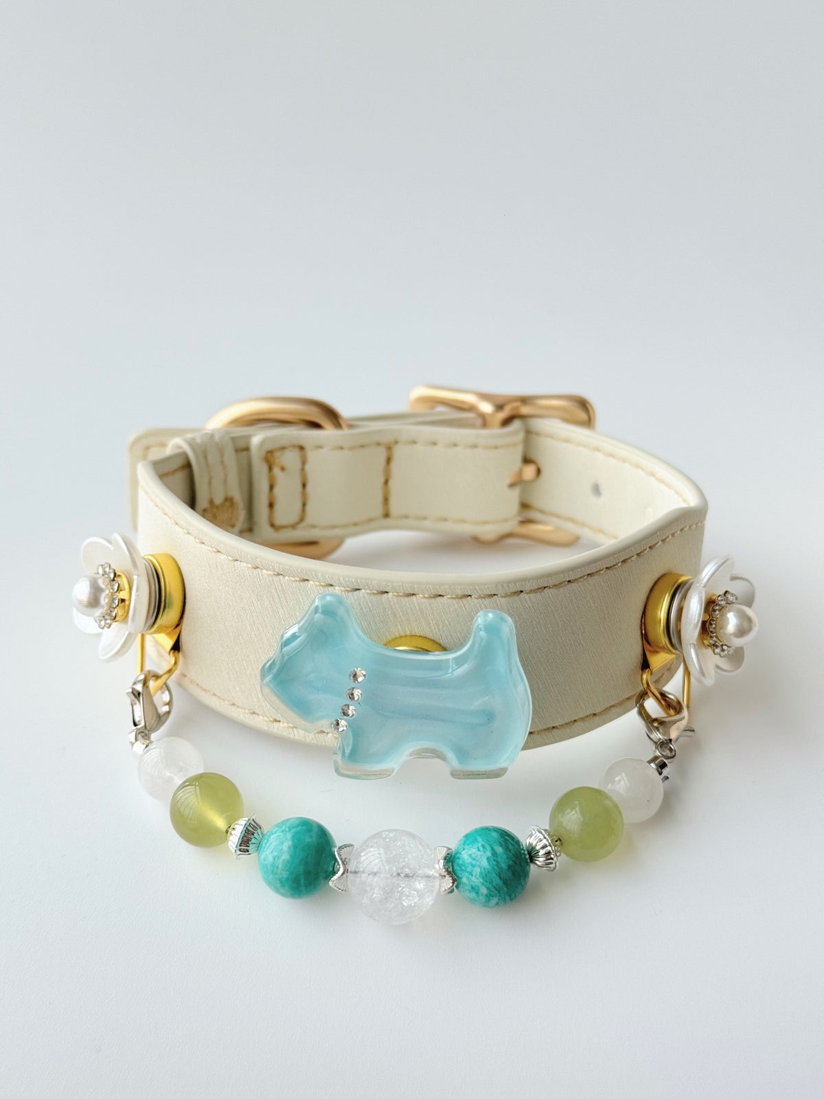 Pawlsle Trails Light blue dog collar, crafted from off-white microfiber leather and accented with a handmade natural gemstone chain; designed for a comfortable fit that won’t snag or pull on fur. Style 1