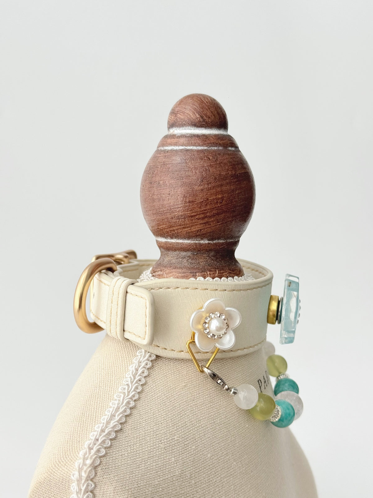 Pawlsle Trails Light blue dog collar, crafted from off-white microfiber leather and accented with a handmade natural gemstone chain; designed for a comfortable fit that won’t snag or pull on fur.