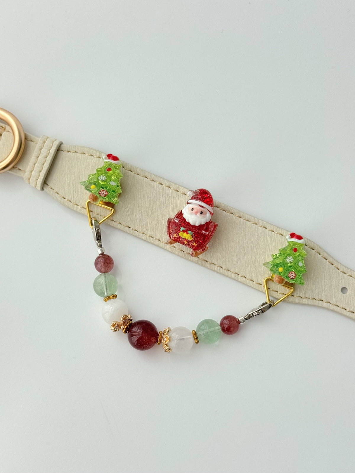 Pawlsle Trails Handmade Christmas-themed microfiber leather crystal pet collar, featuring Santa Claus and Christmas tree charms.