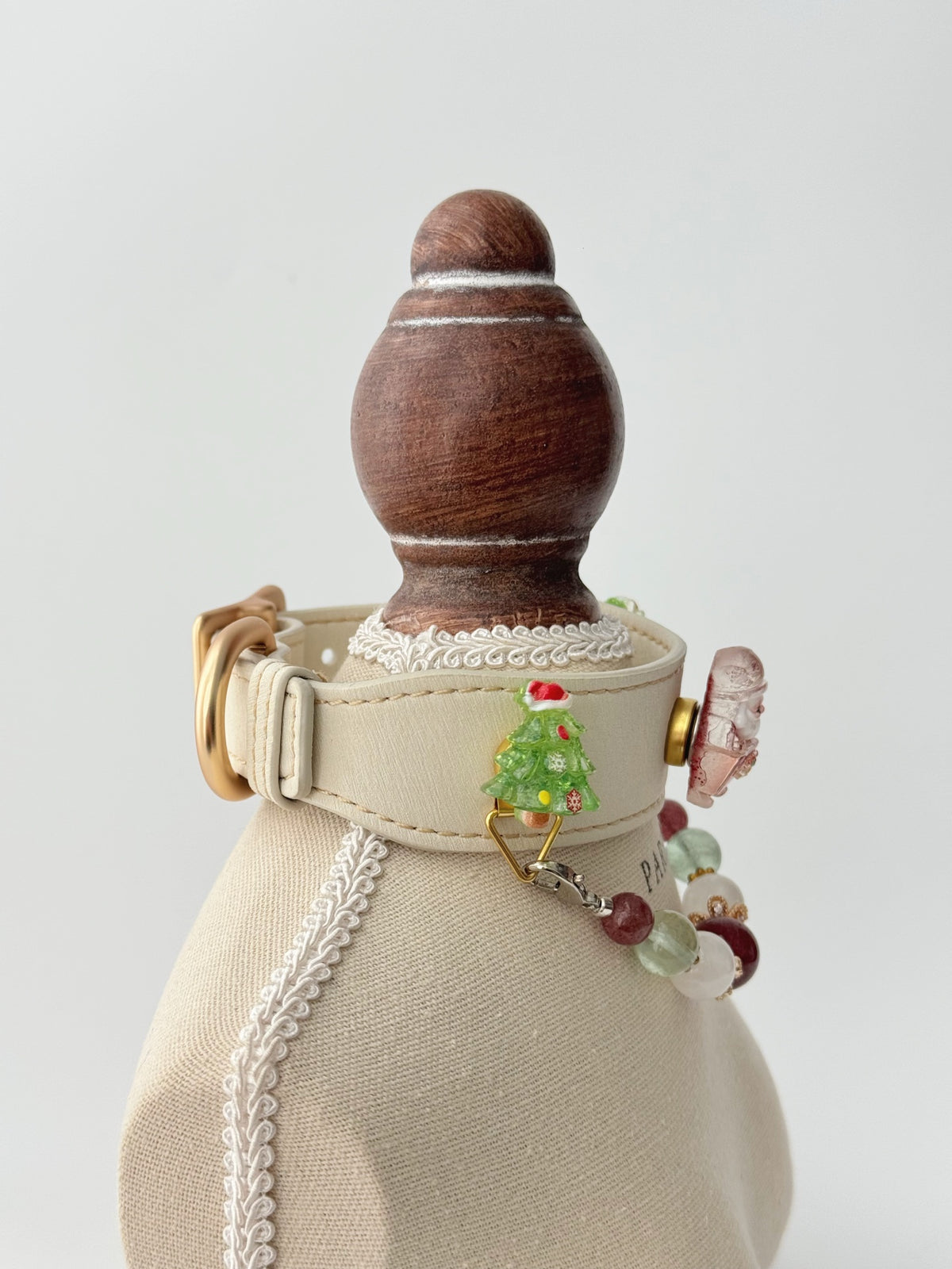 Pawlsle Trails Handmade Christmas-themed microfiber leather crystal pet collar, featuring Santa Claus and Christmas tree charms.